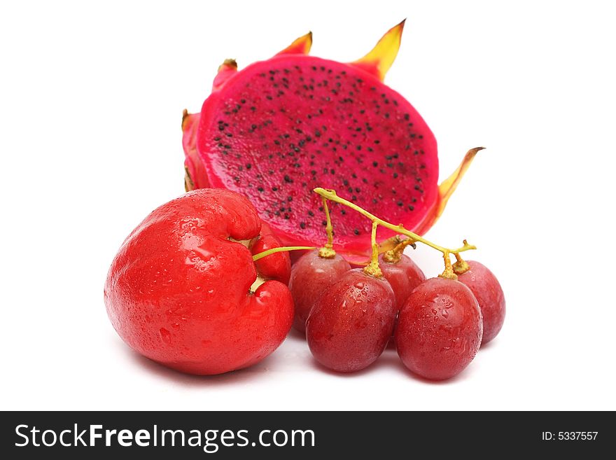 Red dragon fruit, grape and water apple on white background. Red dragon fruit, grape and water apple on white background.