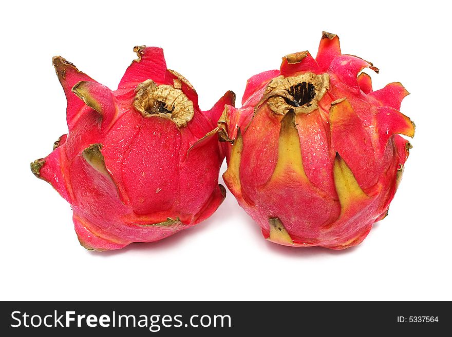 Two red dragon fruits isolated on white background.