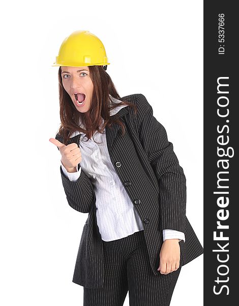 Young businesswoman with helmet on white background