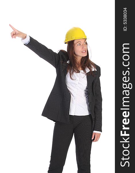Young businesswoman pointing up on white background