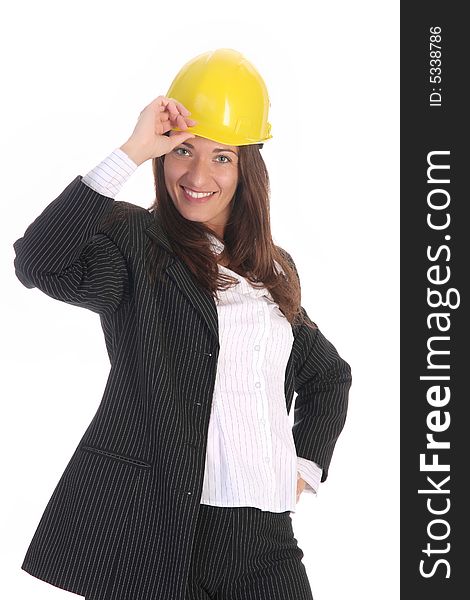 Young businesswoman with helmet on white background