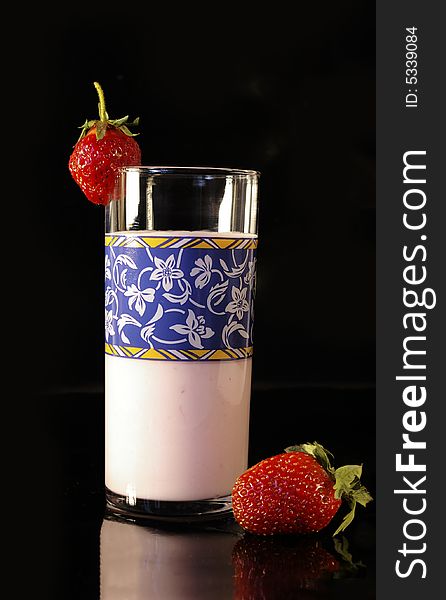 Glass of yoghurt and ripe fresh strawberry. Glass of yoghurt and ripe fresh strawberry