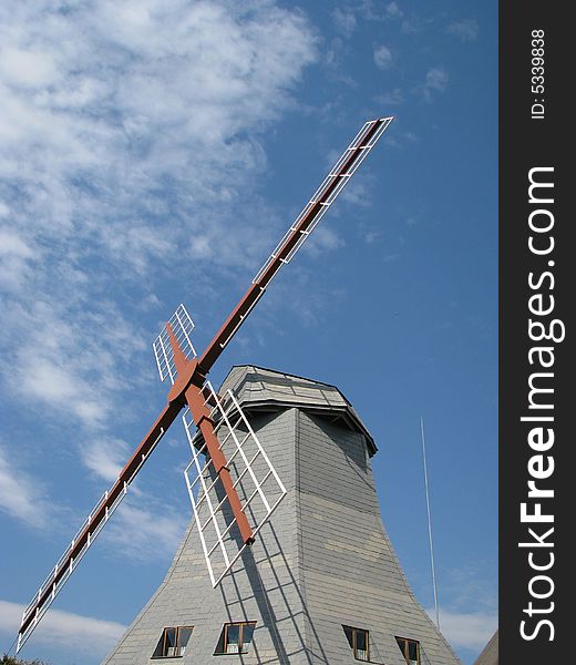 Windmill Stretching Into Sky