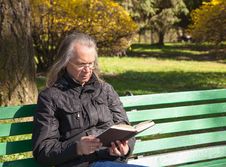 Haired Elderly Man Reading A Book Sitting On A Bench In City Par Stock Image Haired Elderly Man Reading A Book Sitting On A Bench In City Par Stock Image