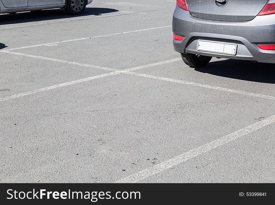 The car is parked in the parking lot. The car is parked in the parking lot