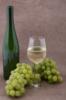 White Wine With Bottle, Glasses And Grapes Royalty Free Stock Images