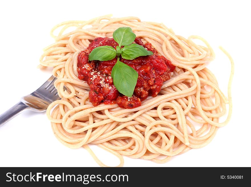 Spaghetti bolognese served on white plate. Spaghetti bolognese served on white plate