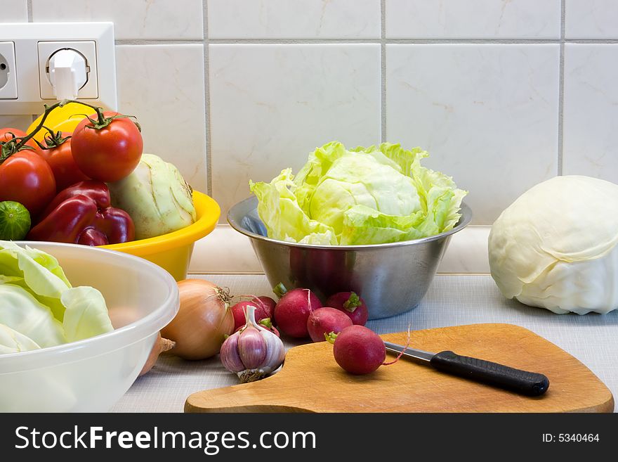 Vegetables for dinner in a kitchen. Vegetables for dinner in a kitchen.