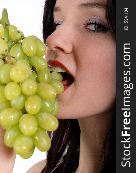 Green grape and nice women, isolated fruit. Green grape and nice women, isolated fruit