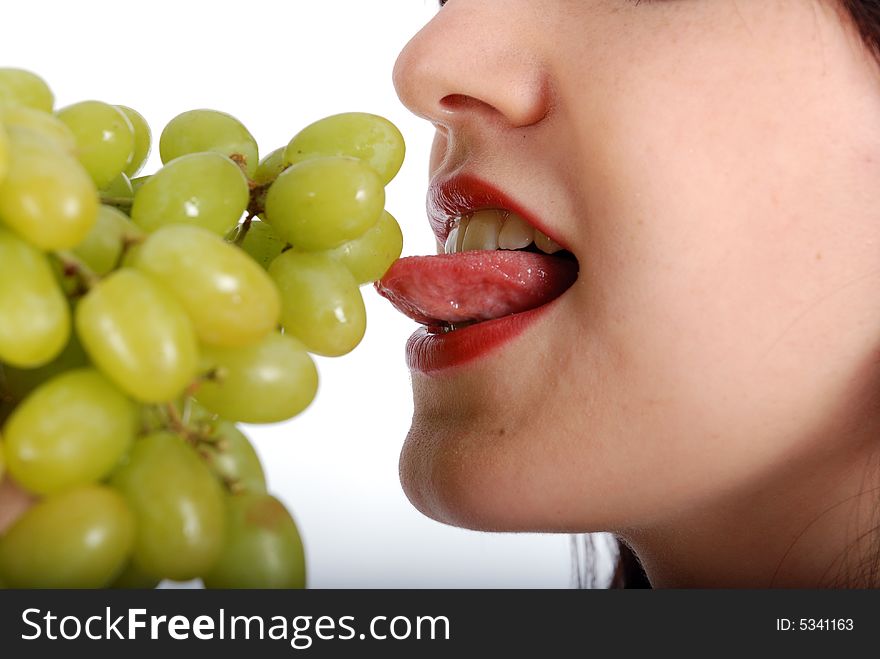 Green grape and nice women, isolated fruit. Green grape and nice women, isolated fruit