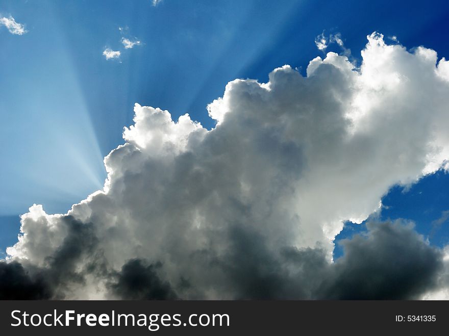 Cloudy sky and sunbeams.nice weather. Cloudy sky and sunbeams.nice weather