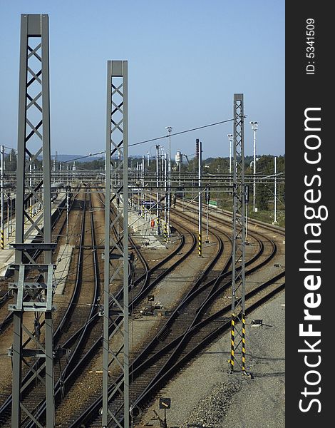 Rails and traction pylons in the railway station