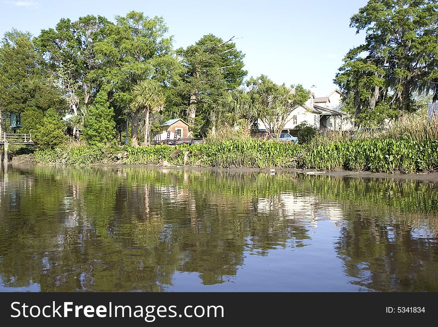 Old homes along a deep inter-coastal river. Old homes along a deep inter-coastal river