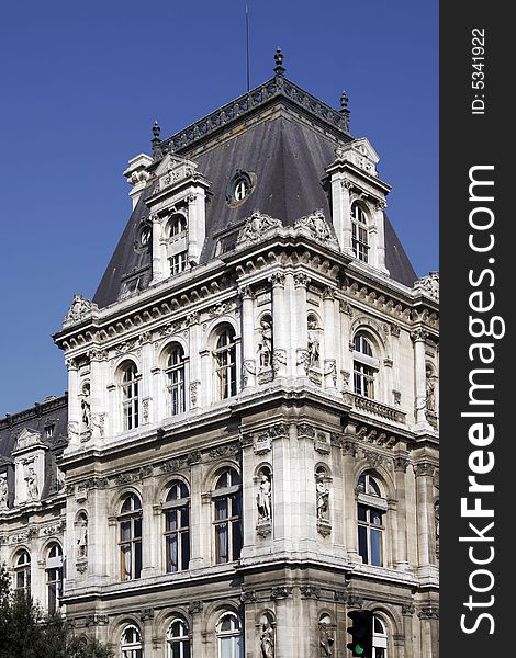 Typical Old French Building Facade On A Sunny Summer Day, Paris, France. Typical Old French Building Facade On A Sunny Summer Day, Paris, France