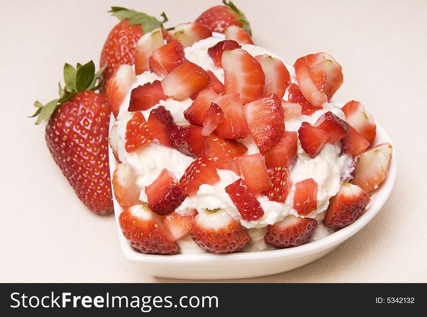 Dessert from a strawberry with a cream. Dessert from a strawberry with a cream.