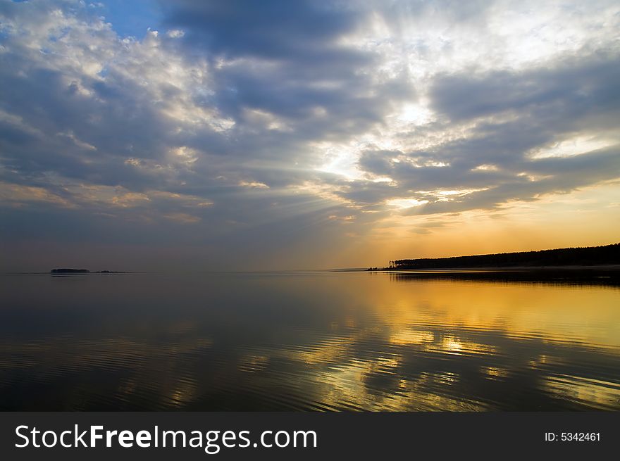 Sky, sea and forest coast on horizon. Sky, sea and forest coast on horizon