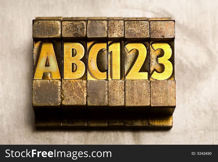 The word ABC123 done in old letterpress type.