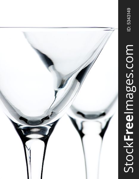 Close up of empty martini glasses on white background. Close up of empty martini glasses on white background