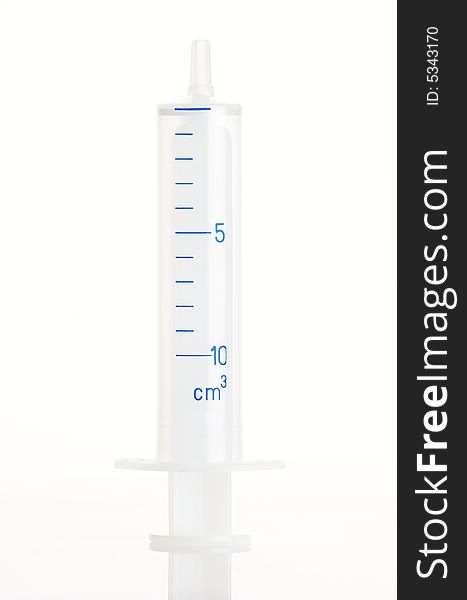 Syringe on white background, vertical image