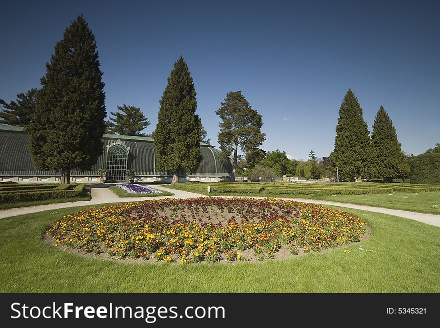 Palace park in french style with ancient greenhouse. Palace park in french style with ancient greenhouse