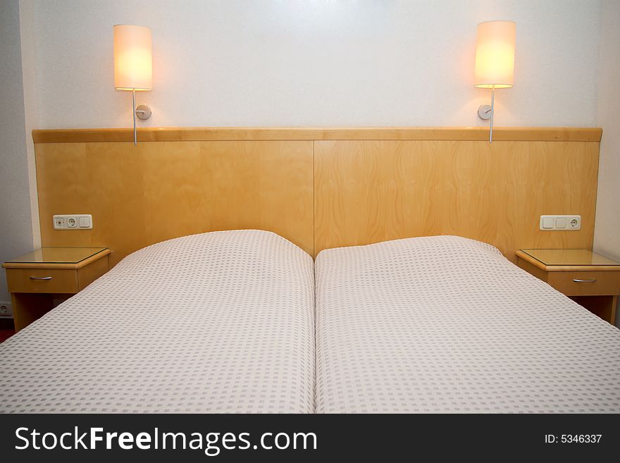 Empty hotel room with the beds