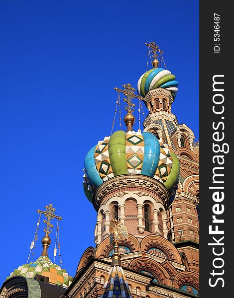 Russian Christian temple with mosaic domes. St.-Petersburg.