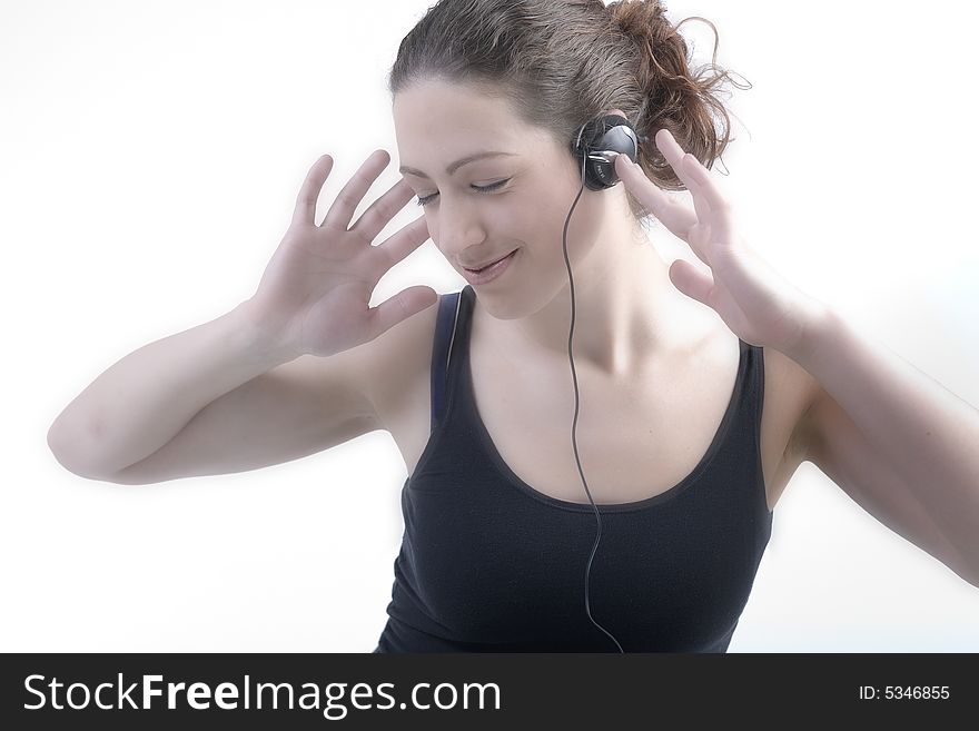 Woman with long curly hair enjoying the music