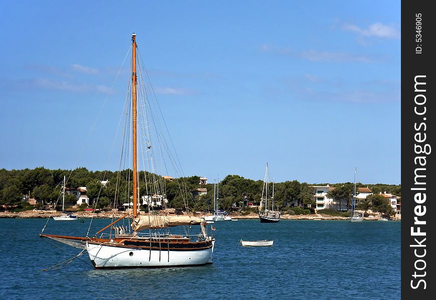 Sailboat in the bay of Porto Colom in Mallorca (Spain). Sailboat in the bay of Porto Colom in Mallorca (Spain)