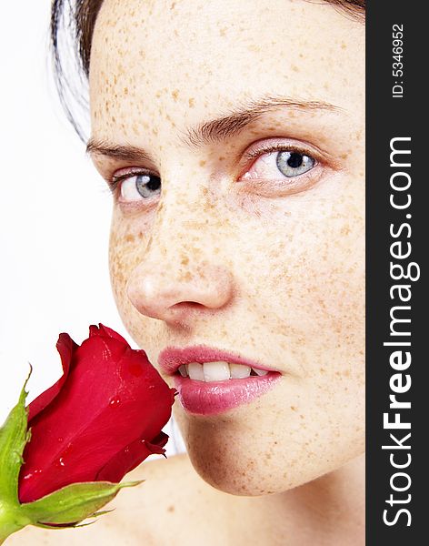 Beautiful brunette woman holding a single red rose. Beautiful brunette woman holding a single red rose