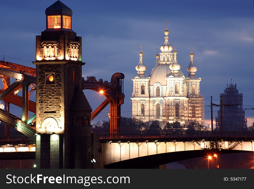 View of Saint-Petersburg on Peter the Great bridge and cathedral Smolny. View of Saint-Petersburg on Peter the Great bridge and cathedral Smolny.