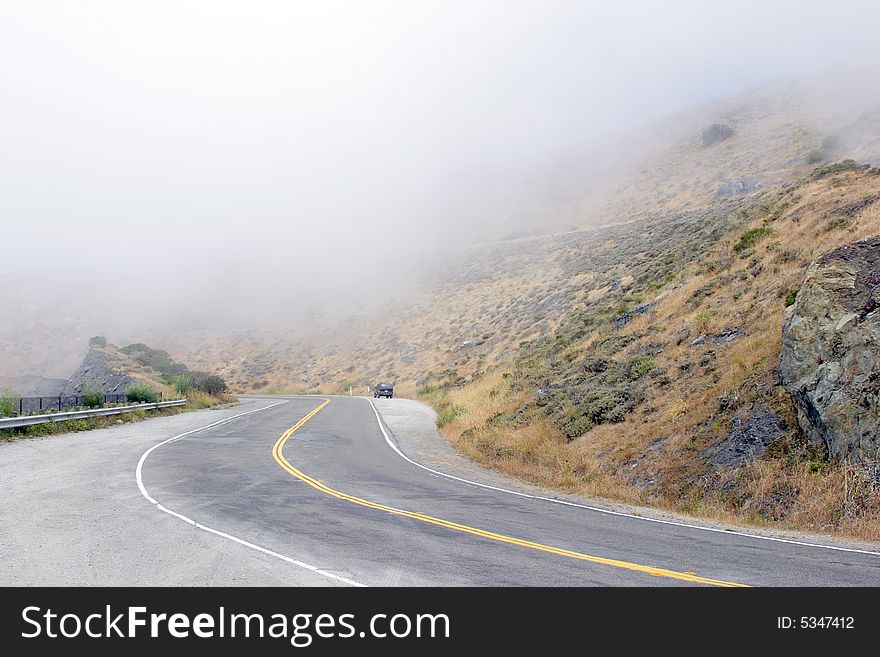 Foggy road in the mountains