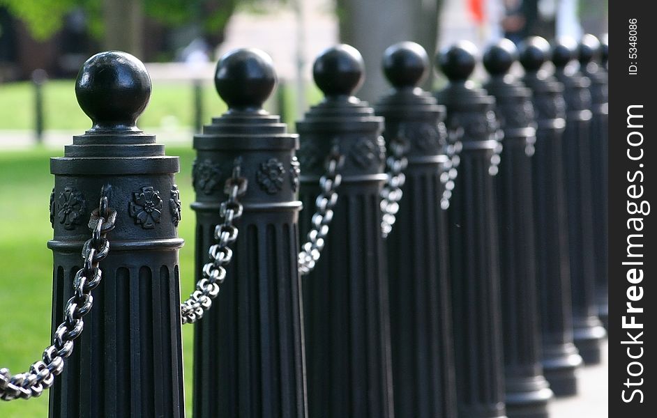 Black chained barrier to protect lawn