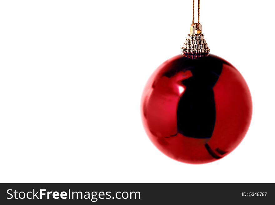 An isolated christmas ball over white background