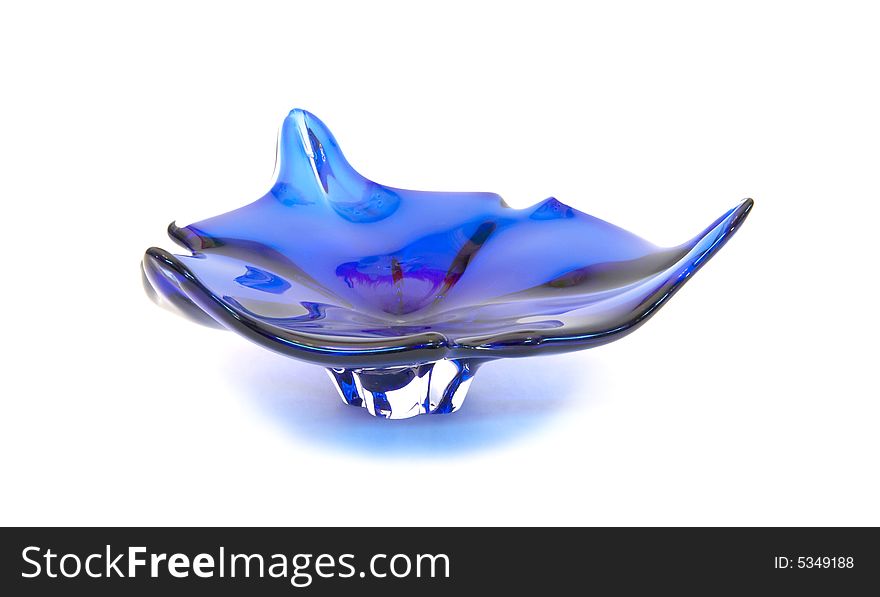 Blue glass ashtray close-up, isolated over white background