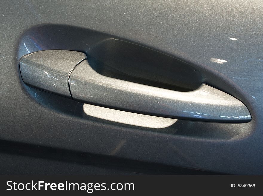 Grey car door with door handle. Grey car door with door handle