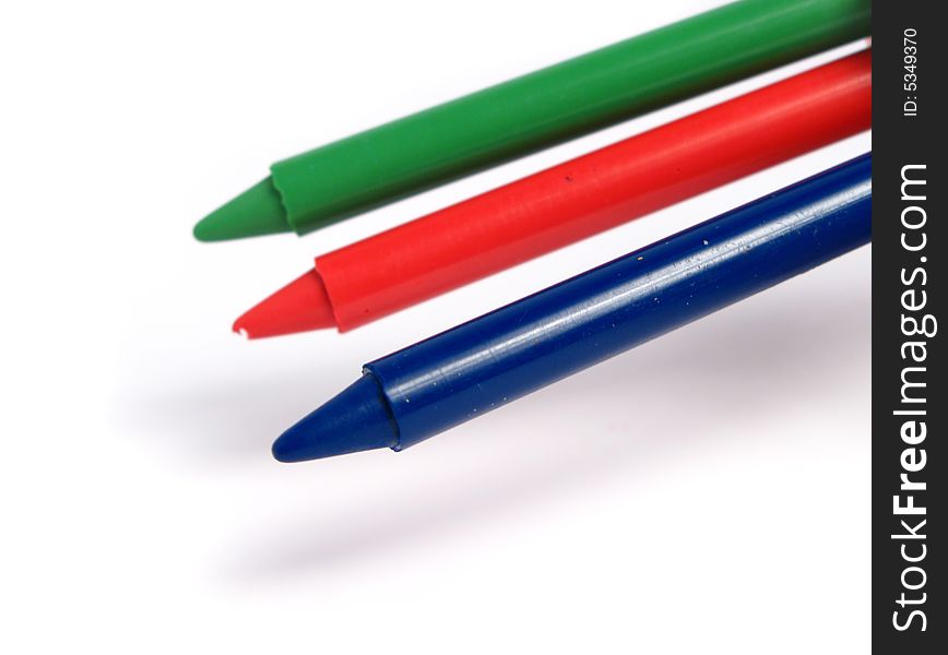 RGB color crayons on a white background