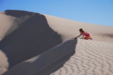 Young Girl Playing On Sand Dunes Stock Photos Young Girl Playing On Sand Dunes Stock Photos