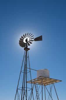 Rustic Windmill Against A Blue Sky Royalty Free Stock Images Rustic Windmill Against A Blue Sky Royalty Free Stock Images