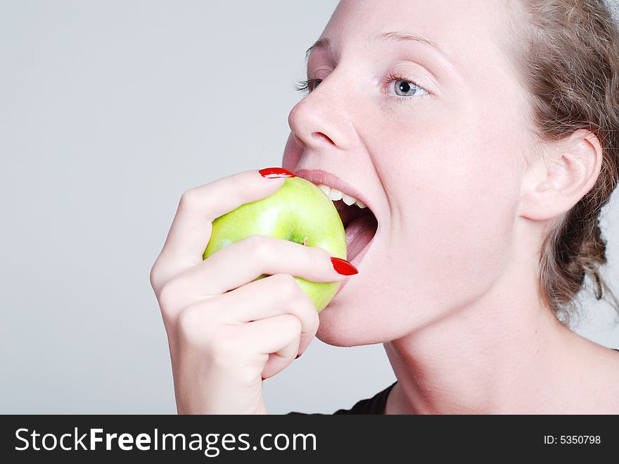 The Girl Biting An Apple