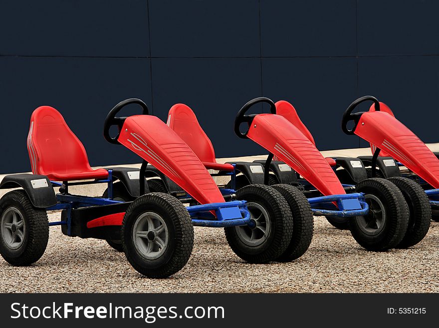 Parking station with pedal cars for renting. Parking station with pedal cars for renting