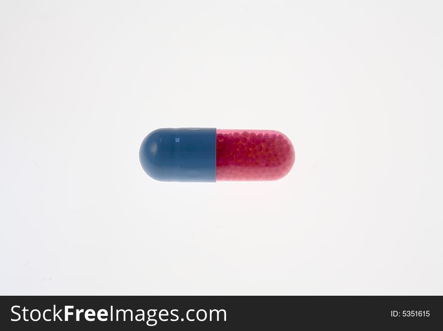 Isolated blue and red capsule. Isolated blue and red capsule