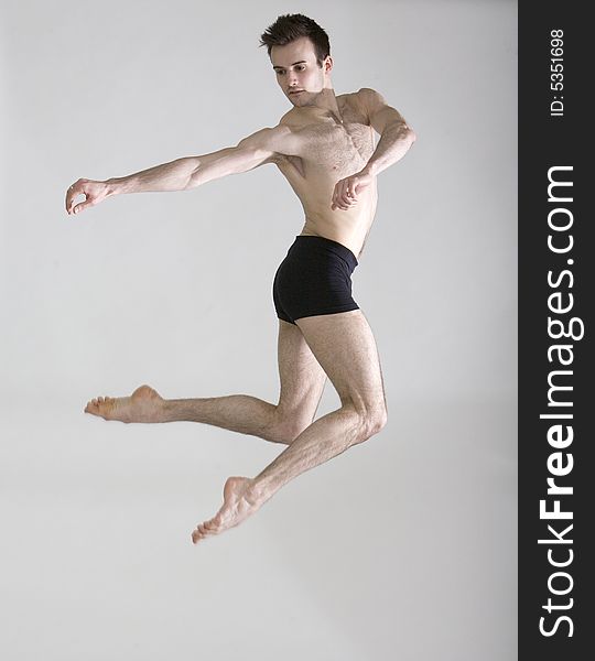 Young Male muscular dancer ieaping. Young Male muscular dancer ieaping