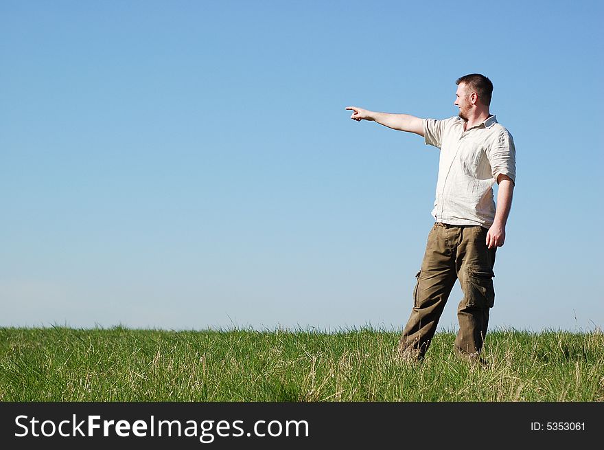 Happy man on green meadow. Happy man on green meadow