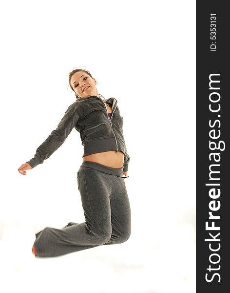 Active woman jumping on white background. Active woman jumping on white background