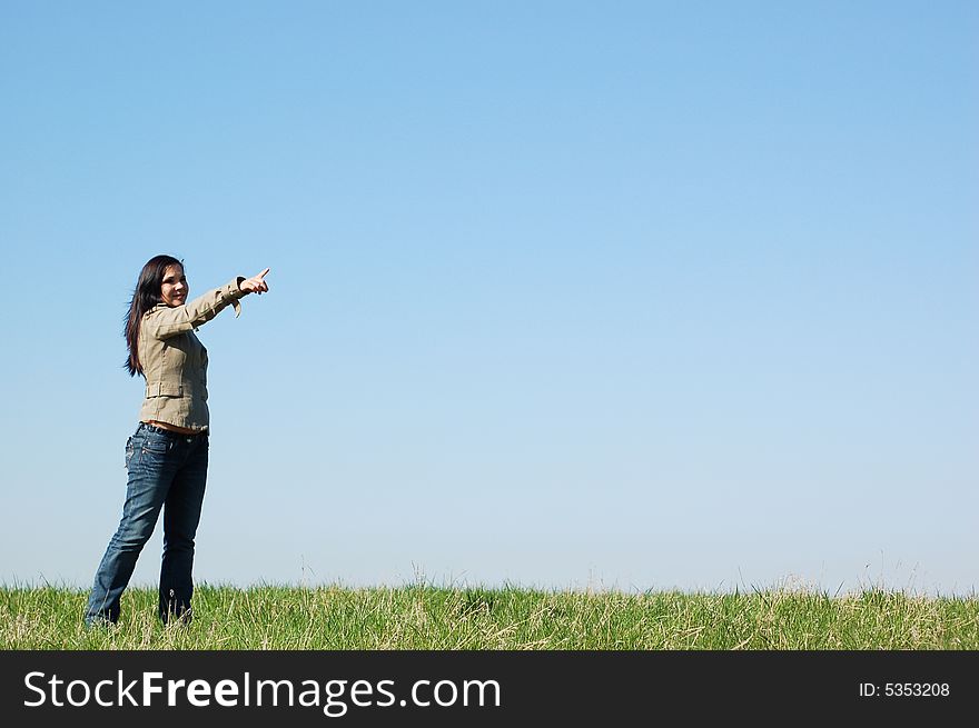 Attractive woman on sky background