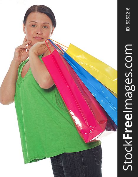 Attractive woman with shopping bags on white background