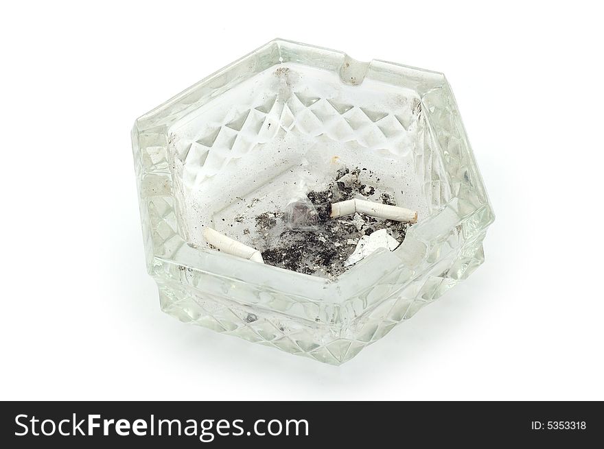 Glass ashtray on the white background. Glass ashtray on the white background.