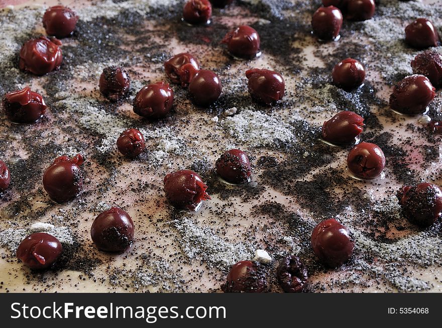 Preparing home made pie with sour cherry