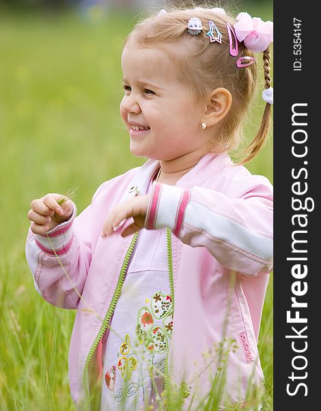 Happy little girl outdoor portrait
