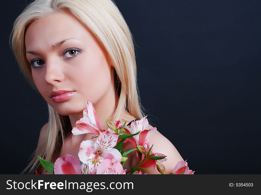 Woman With Bunch Of Flowers